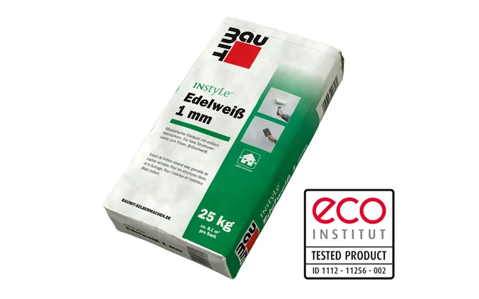 Brillantweisser, wohngesunder Edelputz Baumit InStyle Edelweiss in 1 mm Körnung für feine Putzstrukturen, gefilzt, frei modelliert.