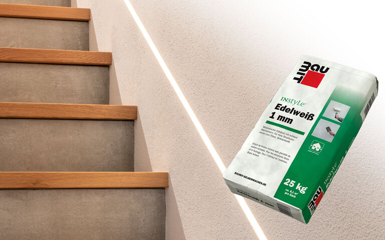 Modernes Treppenhaus mit Beton, indirekter Beleuchtung und dem wohngesunden Baumit Edelputz InStyle Edelweiss.