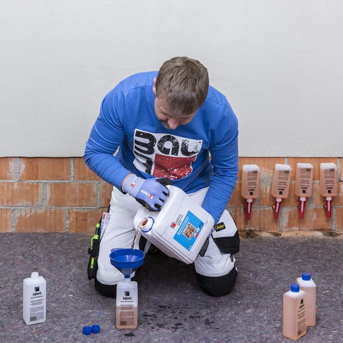 Remplir à nouveau les bouteilles individuelles de barrage de maçonnerie