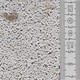 Échantillon de couleur claire Baumit crépi mosaïque M 337 Montblanc avec mica et échelle.