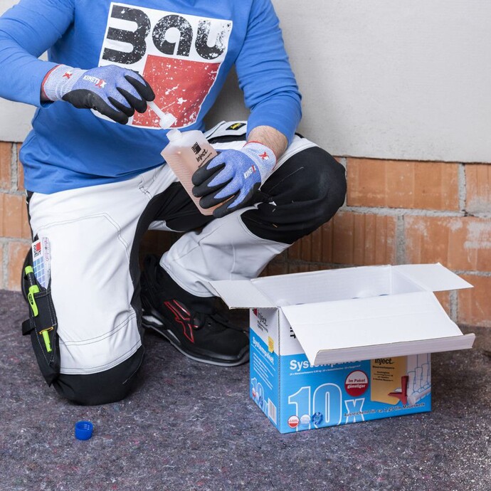 Visser le tube d'écoulement sur la cartouche individuelle Barrière de maçonnerie