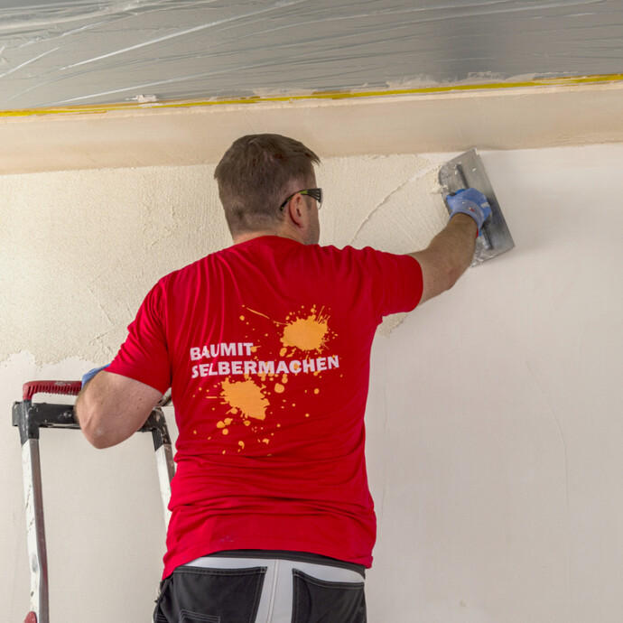 Application structurée de l'enduit décoratif