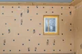 Innenwand mit installierten Dämmplatten, vorbereitet für weiteren Ausbau.